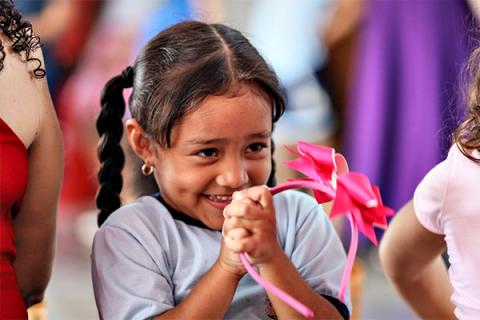 Aluna da escola Muito Feliz 